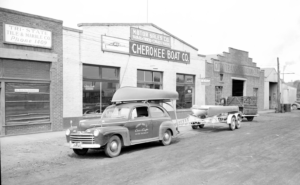 historic: old car in front of cherokee boat company