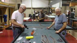 seniors putting together trainset