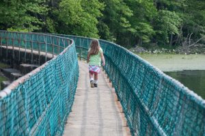 girl on bays mountain bridge
