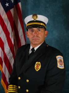 Portrait of Deputy Fire Chief Terry Arnold in his class A uniform.