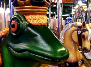 frog carving on carousel
