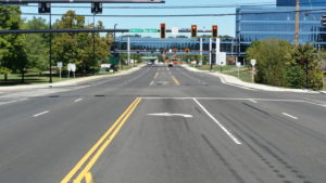 stoplights over paved road